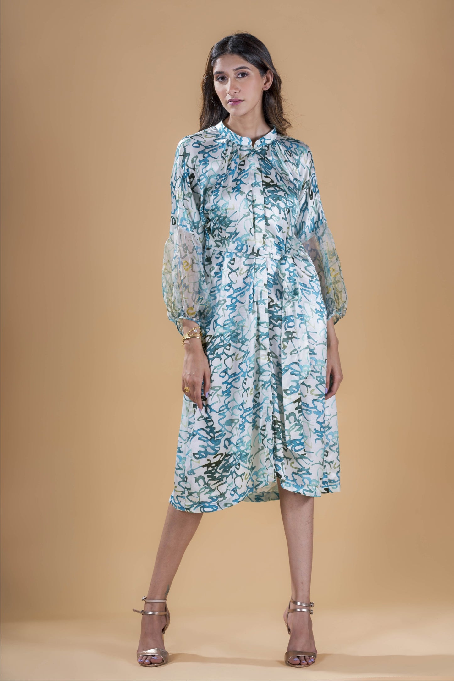 Teal calligraphy print tie-up shirt dress.