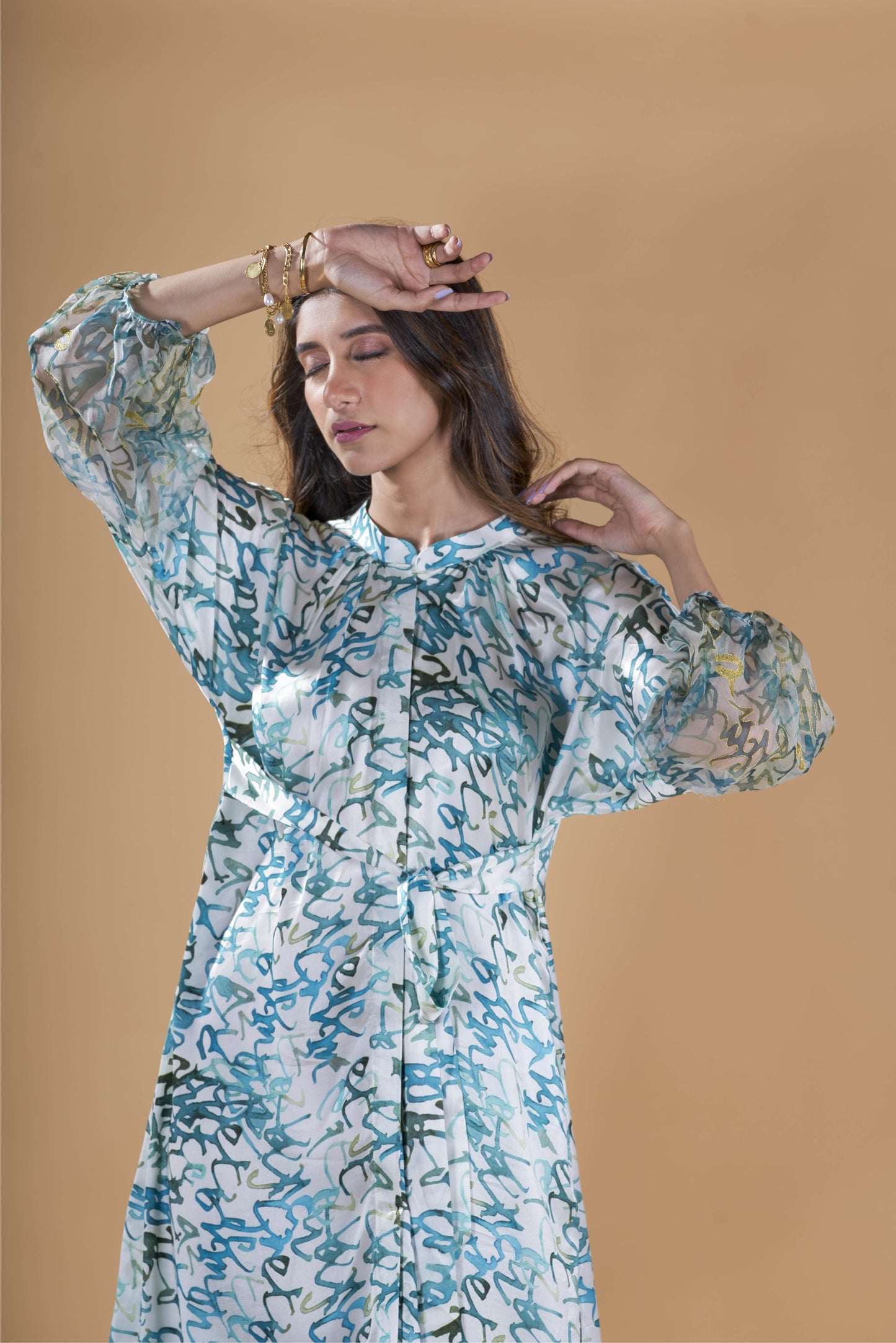 Teal calligraphy print tie-up shirt dress.