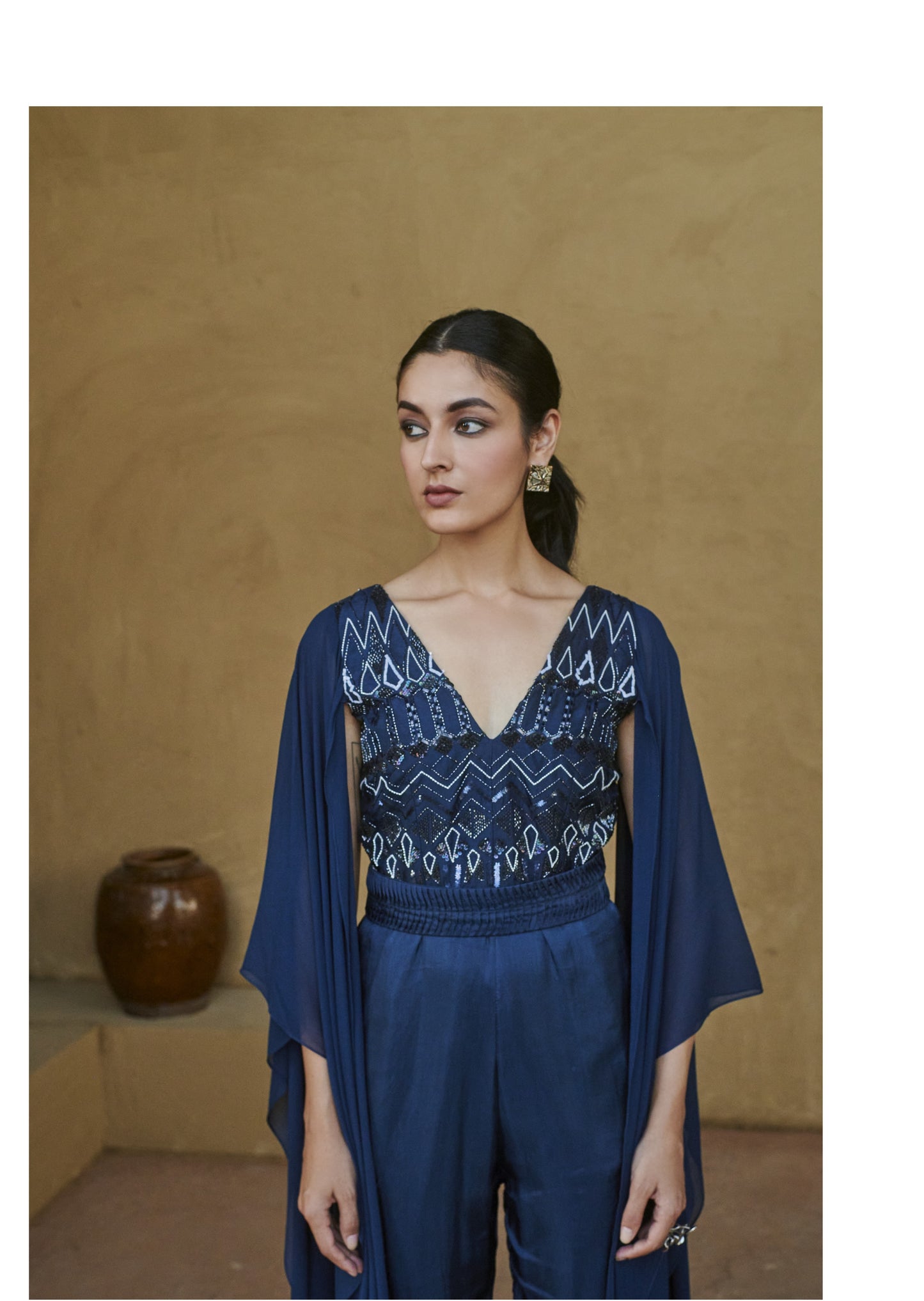 Navy Blue Beaded Cape Sleeve Slit Jumpsuit.