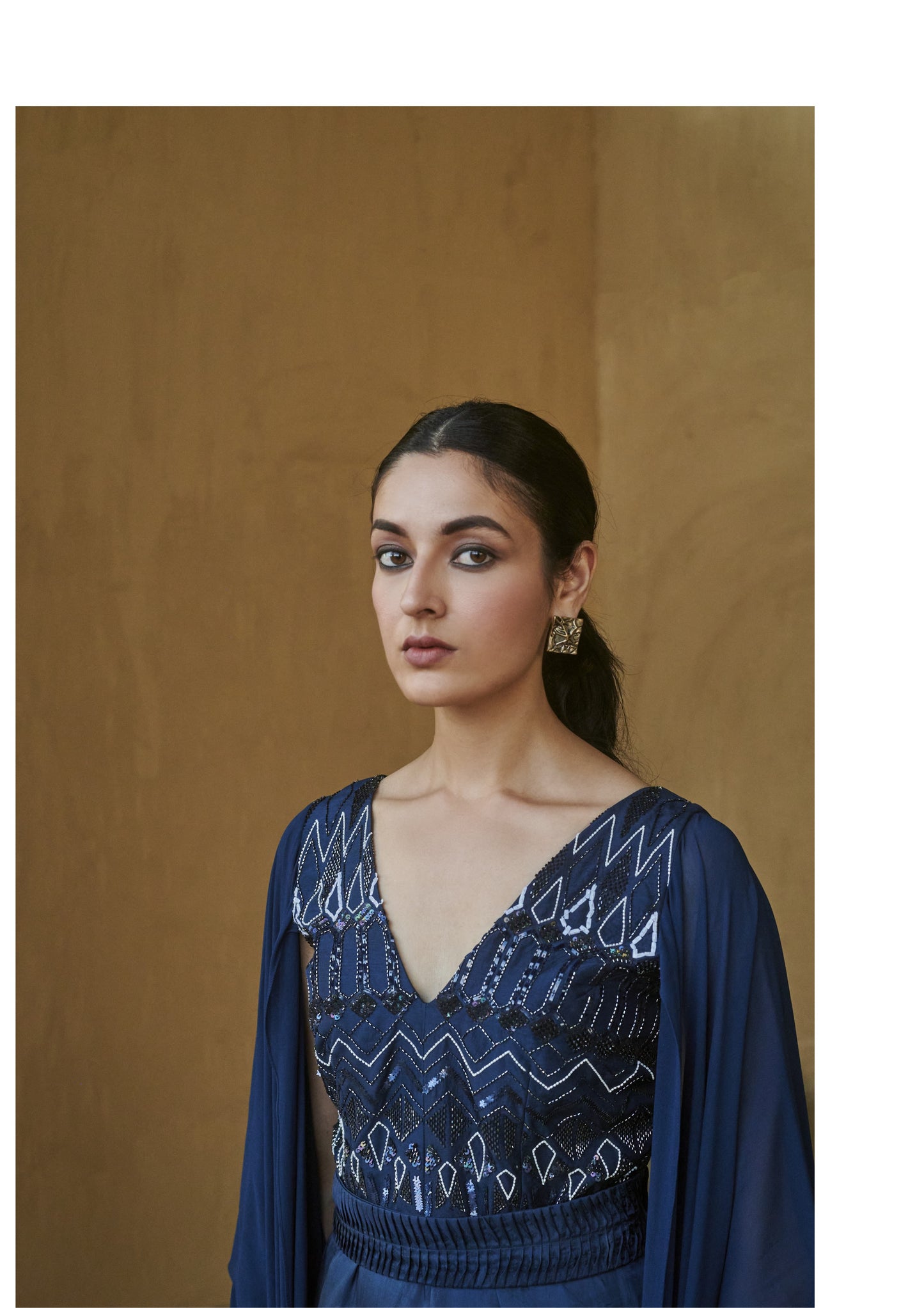 Navy Blue Beaded Cape Sleeve Slit Jumpsuit.