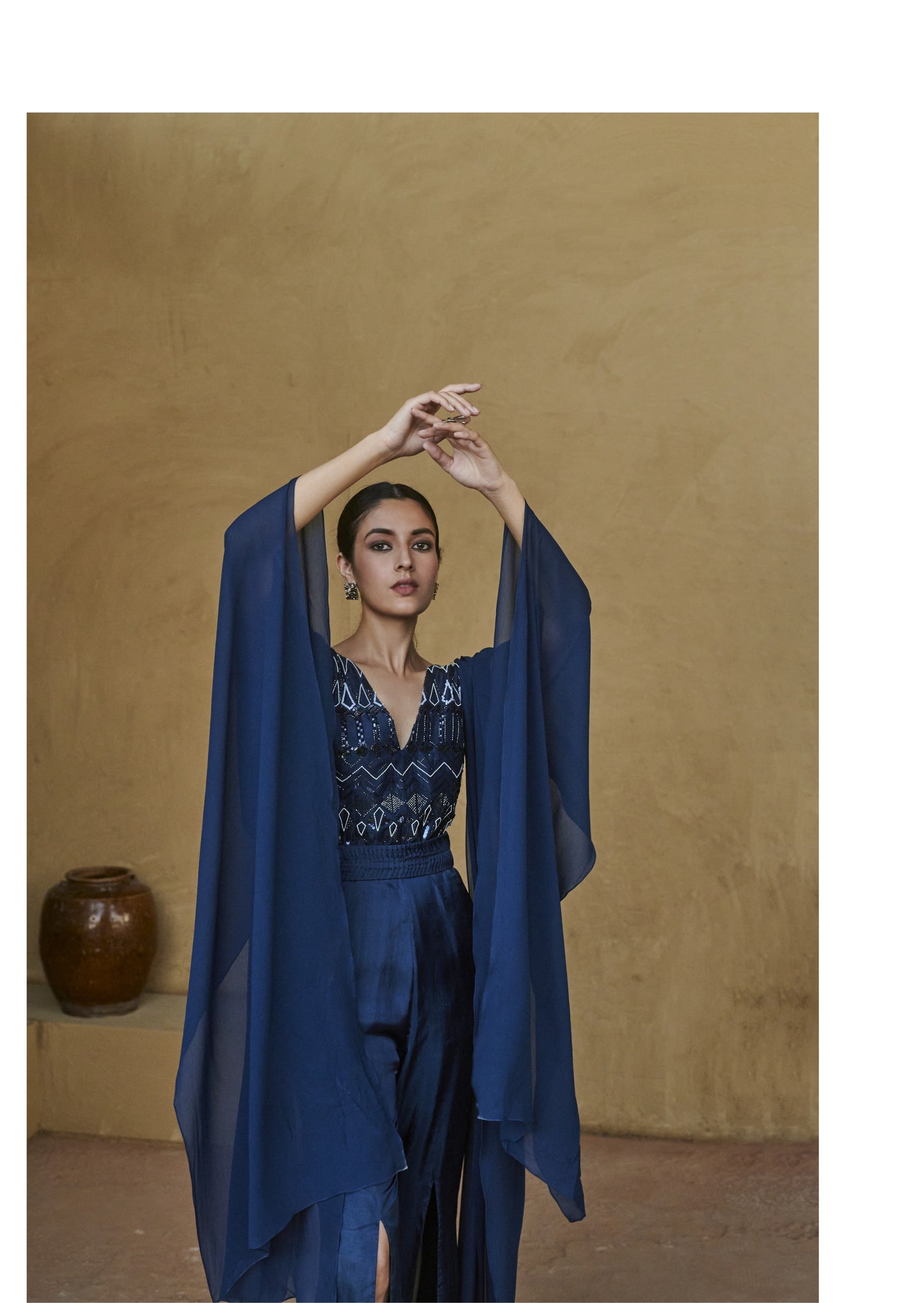 Navy Blue Beaded Cape Sleeve Slit Jumpsuit.