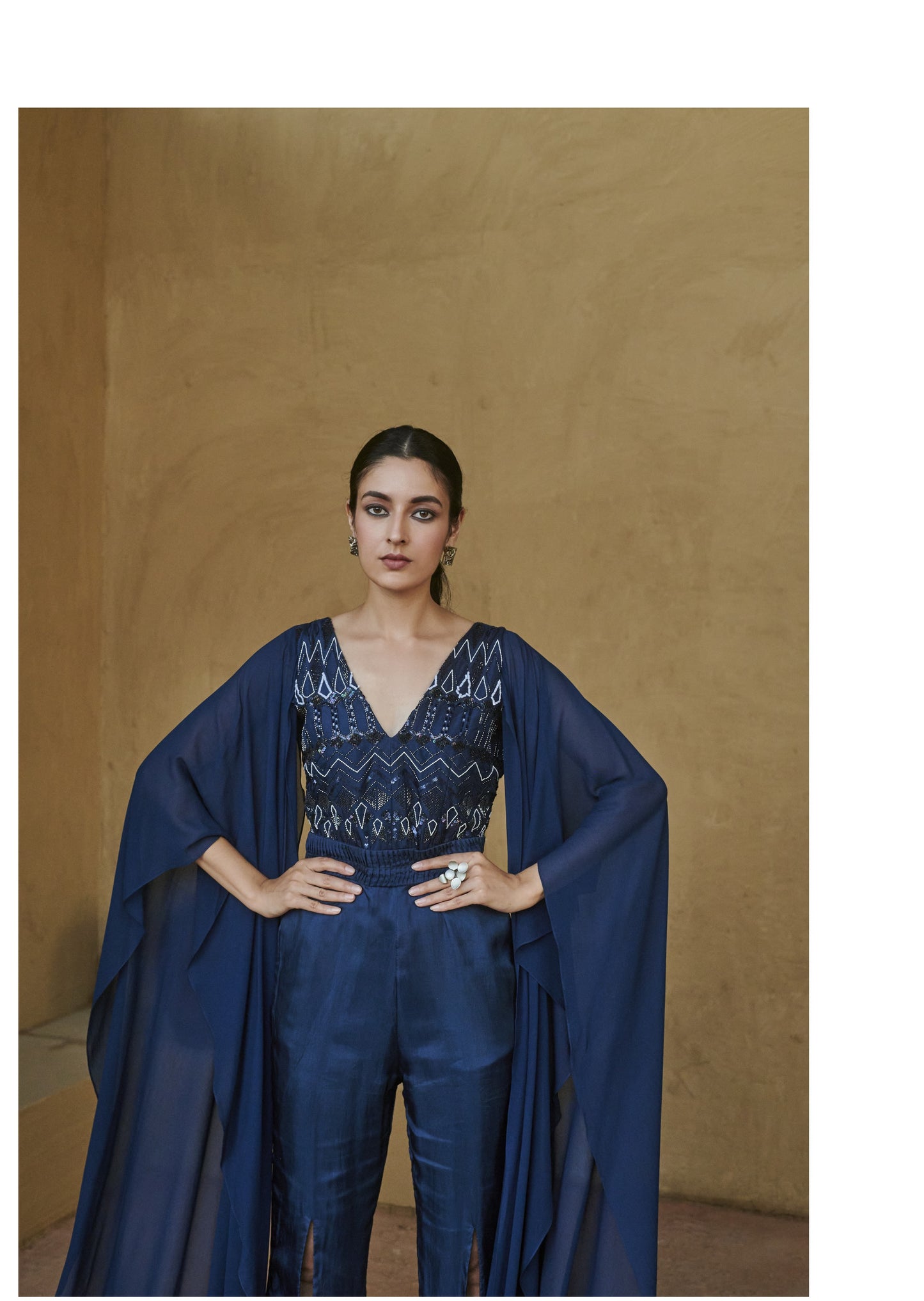 Navy Blue Beaded Cape Sleeve Slit Jumpsuit.