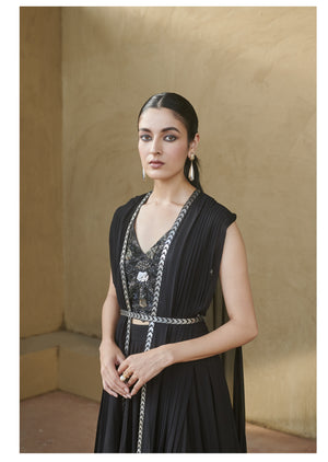 Black beaded bustier with pleated jacket set.