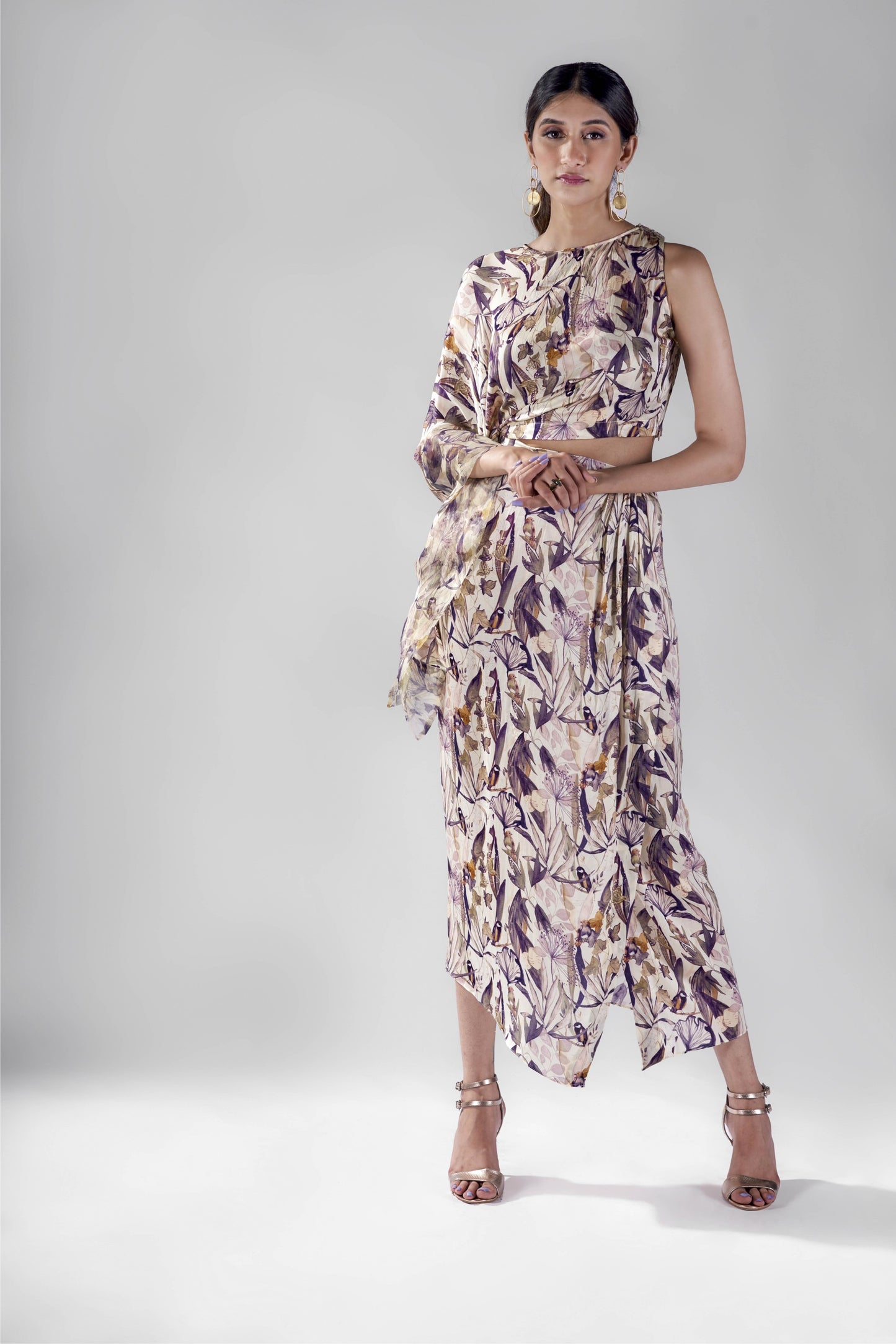 Offwhite bird print draped top with wrap skirt set.