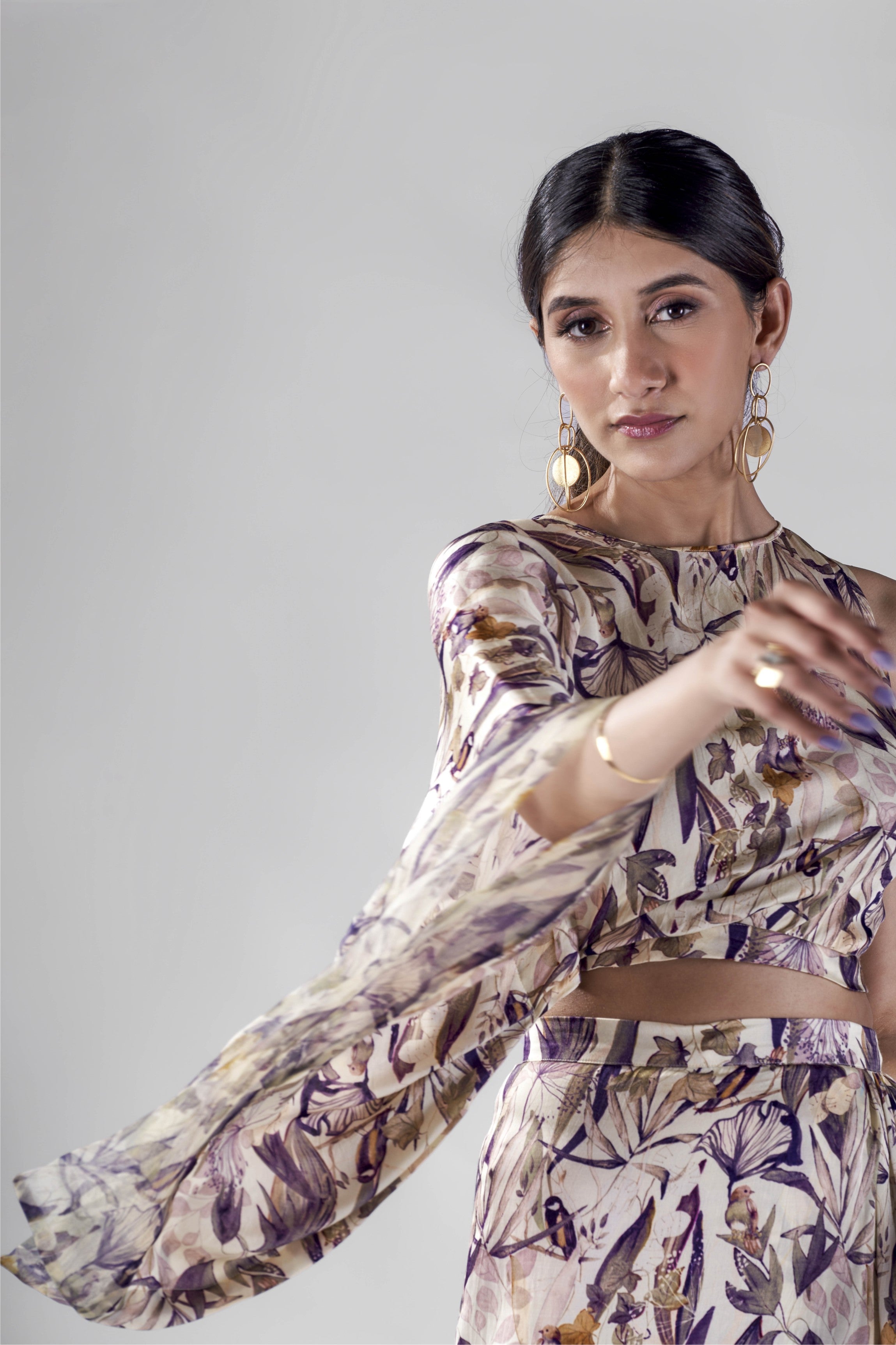 Offwhite bird print draped top with wrap skirt set.